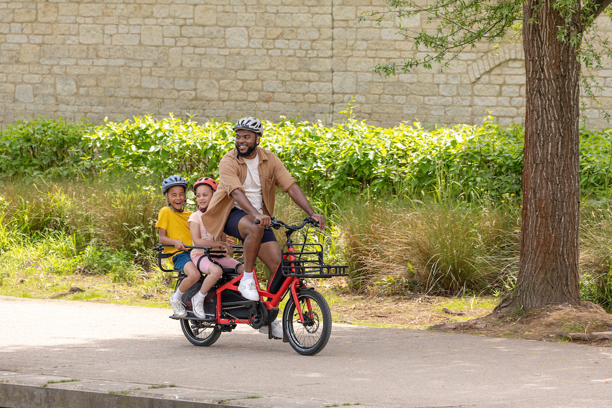 Tern Quick Haul Long cargo ebike carries 2 kids to replace the car