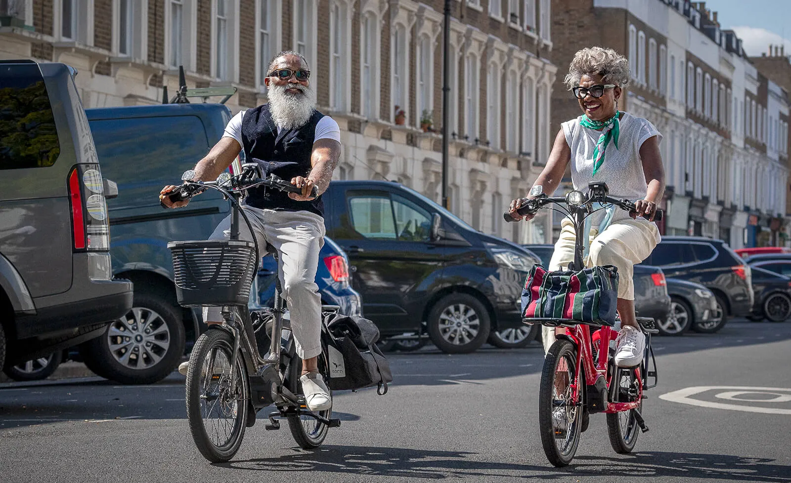 Elder couple riding the ebike NBD in the street