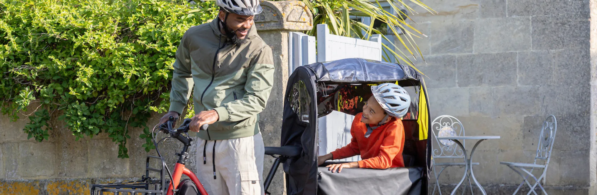 Banner image showing the Clubhouse Fort bike weather canopy for kids on a Tern Quick Haul Long cargo electric bike.