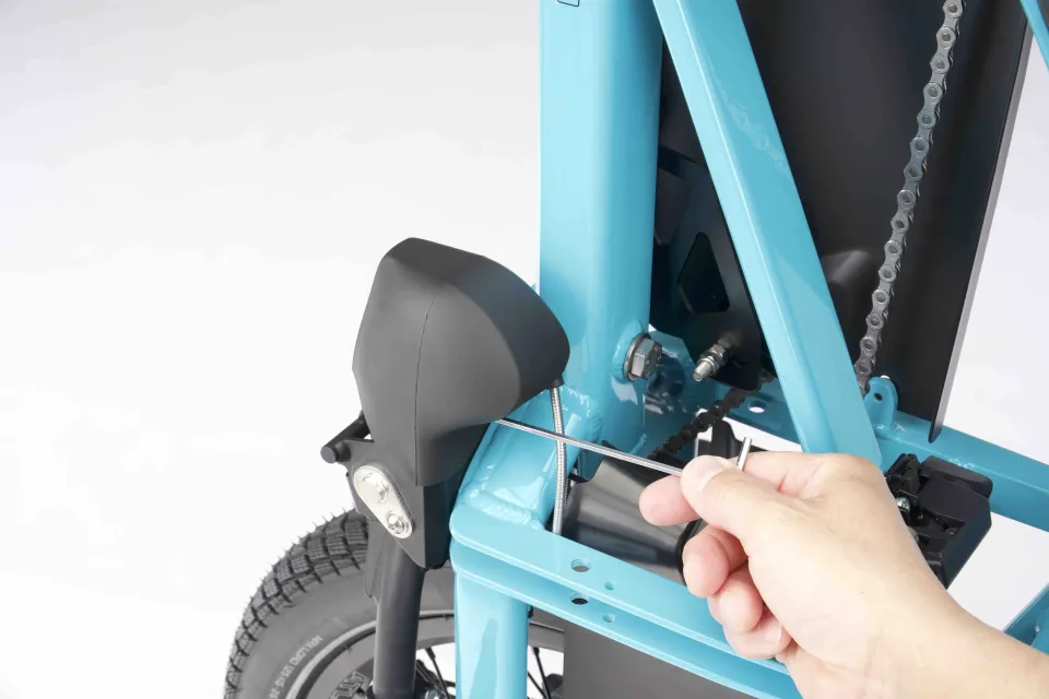 Use the 3 mm Allen wrench to remove the cover screw of the Tern GSD Gen 3 Atlas Lockstand rubber cover.