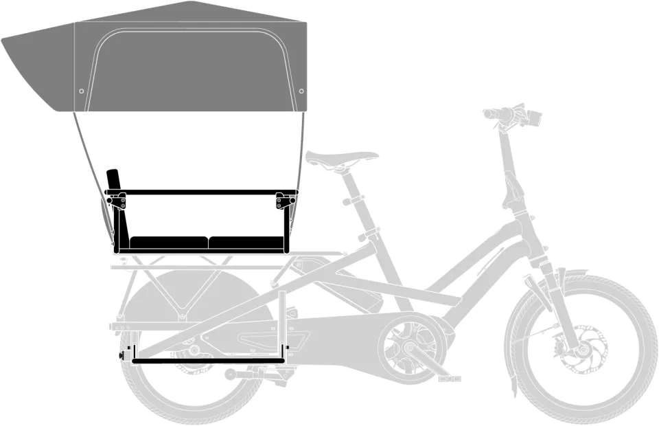 Sun Shield Gen 1 weather canopy for kids with two Sidekick Seat Pads, a Sidekick Backrest, and the Stow Decks footrest positioned on a Tern e cargo bike's rear rack.