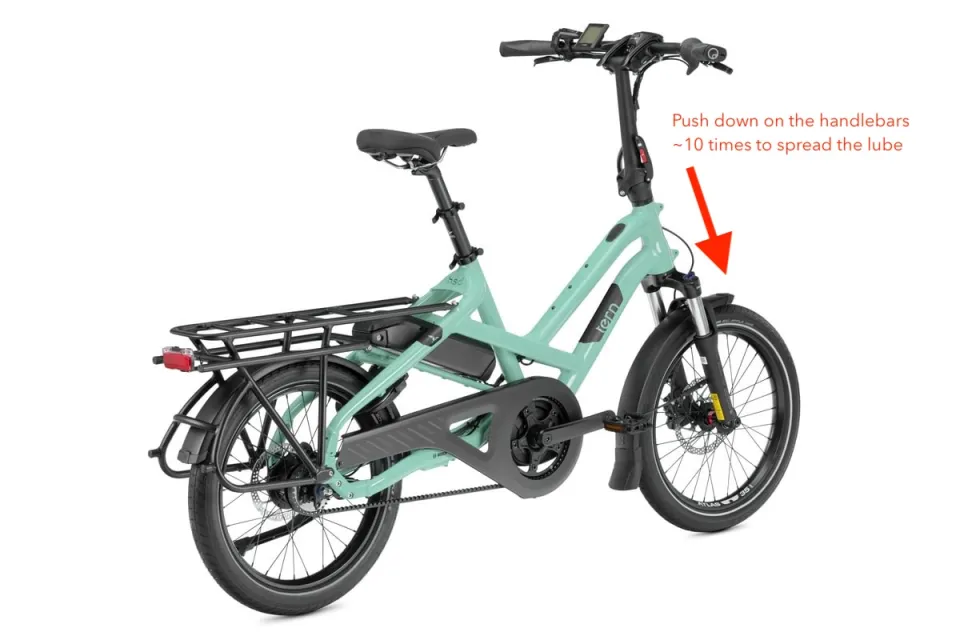 Pressing on the Tern ebike handlebar 10 times to spread lube