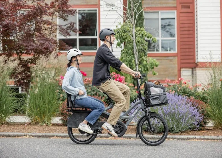 Man carrying female passenger on HSD Gen 3 ebike